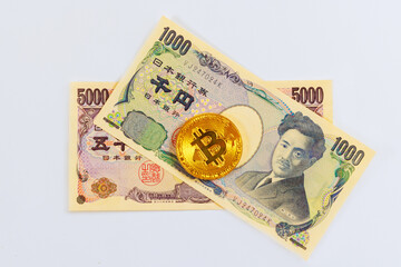 Japanese yen is being invested in bitcoin cryptocurrency of blockchain technology digital money e-wallet.