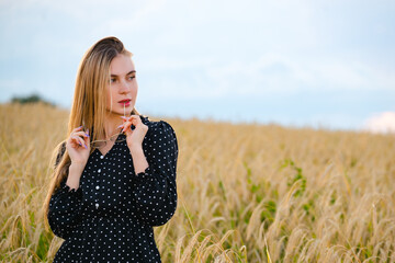 Woman in wheat field