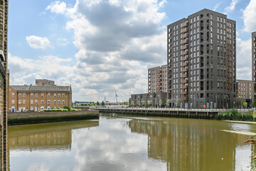 Naklejka premium Modern accommodation in Barking along River Roding: London, UK, 24 May 2024 