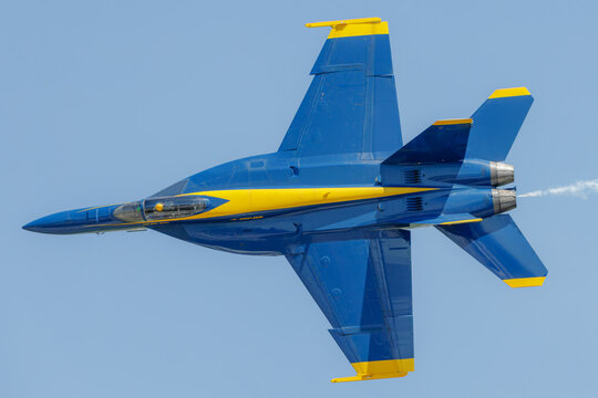 top view of Blue Angels F-18 demonstration aircraft in a high speed pass
