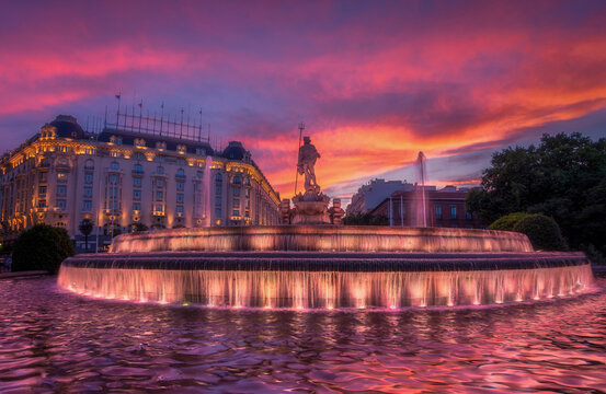 Neptuno Fountain in Madrid during sunset
