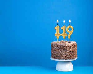 Birthday cake with candle 119 - Invitation card on blue background