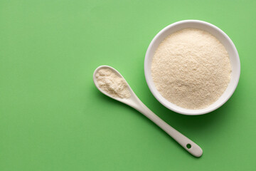 hydrolyzed collagen powder in bowl and spoon - Organic gelatin powder