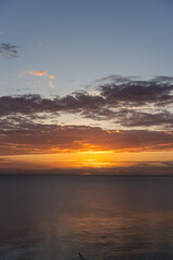 Bright colourful dawn in summer on the Baltic Sea. A couple of minutes before sunrise. Vertical photo High quality photo