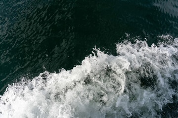  Sea foam splashes as the ship moves. Incredible birch colour of the sea. Beautiful background or screensaver. High quality photo