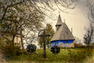Europe, Romania. Maramures County. Aspra village churches painted blue.