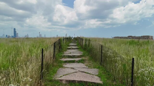 Drone Ascent Through Windy Hillside in Palmisano (Henry) Park, Chicago (Grass Fences & City View)
 Soaring Over Palmisano (Henry) Park 