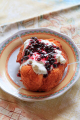 Europe, Romania, Viscri. Traditional dessert, Berry Cobbler with cream.