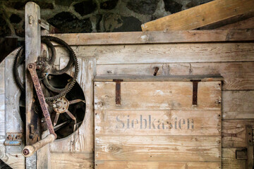 Europe, Romania. Viscri. Old farm machinery.