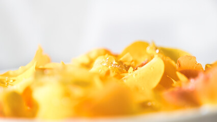 A close up of a yellow fruit with a few pieces missing