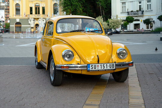 Classic car from 1974 Volkswagen 1200J Buba (VW beetle) in yellow - assemled in Sarajevo, Jugoslavia (Yugoslavia) present Bosnia And Herzegovina. 29.06.2024 Subotica, Serbia