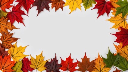 Fototapeta premium Arrangement of colorful autumn leaves forming a border around a central white space.