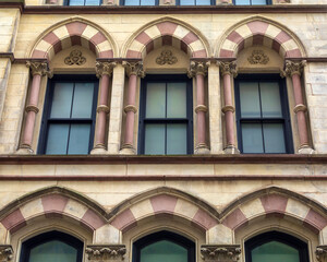 Fototapeta premium Arched windows on a historic building facade, Boston, Massachusetts, USA