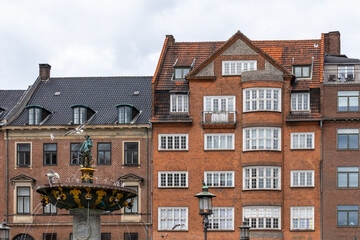 Various photos from the city center of Copenhagen the capital of Denmark harbor palace churches colorful buildings canals and general city view with cloudy weather and sunset colors