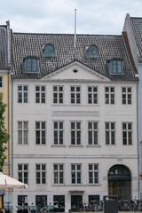 Various photos from the city center of Copenhagen the capital of Denmark harbor palace churches colorful buildings canals and general city view with cloudy weather and sunset colors