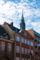 Various photos from the city center of Copenhagen the capital of Denmark harbor palace churches colorful buildings canals and general city view with cloudy weather and sunset colors