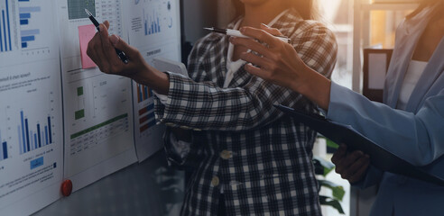 Team of business people working together in the meeting room office, teamwork background charts and graphs banner, double exposure successful teamwork,business planning concept.