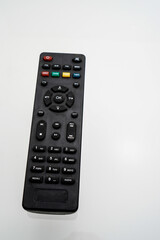 Close-up of remote control for television on white background with clipping path. tv remote isolated on white.