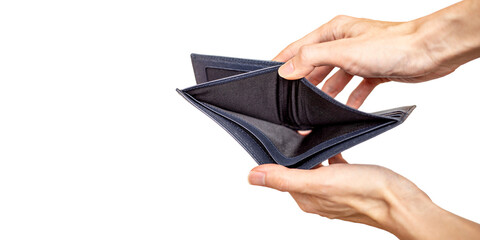 A Caucasian man holding his empty black leather wallet representing financial hardship, bankruptcy,...