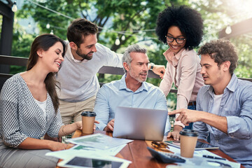 Business people, laptop and talking at cafe meeting, communication and website for plan. Staff, team planning and support or collaboration on project, speaking and brainstorming ideas at restaurant