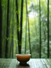 a traditional cup chinese tea followed by Chinese bamboo forest background