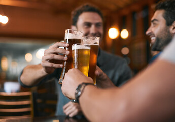 Cheers, friends and beer in pub with glasses as celebration for drinks, happiness or social...