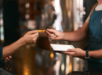 Credit card, tablet and hands of people in cafe for wireless payment at pos counter. Digital technology, sale and closeup of cashier with mockup screen for contactless transaction in coffee shop.
