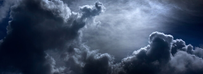 Banner Dramatic dark storm clouds black sky background. Dark thunderstorm clouds rainny season....