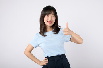 Thumb up. Successful employee asian woman showing thumb up gesture in approval, recommending,...