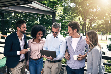 Business people, cafe and teamwork with laptop, creative project and planning with research. Group, employees or leader with website info, tech or online reading for review, feedback or brainstorming