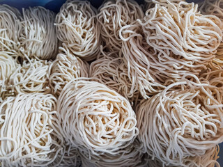 Close-up homemade rolled raw noodles