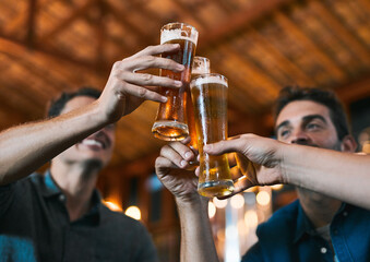 Cheers, friends and beer in restaurant with glasses as celebration for drinks, happiness or social...