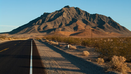 Mojave Desert landscape, looking north, taken in early morning light, including a highway.