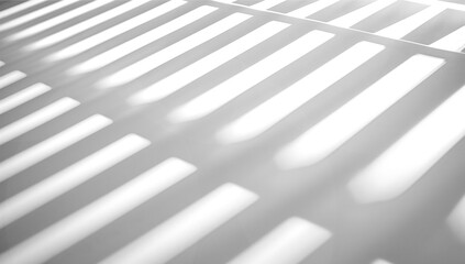 Naklejka premium Empty white wall where sunlight shining through a window