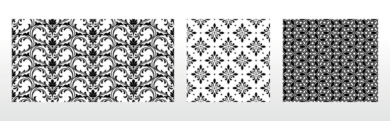 Geometric floral set of seamless patterns. White and black vector backgrounds. Damask graphic ornaments.
