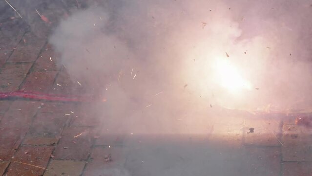 Red firecrackers explode Slow motion at Chinese New Year.