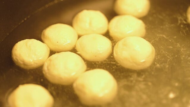 Famous Bengali or Indian sweets. Cheese ball dessert Rasgulla made with syrup in a bowl