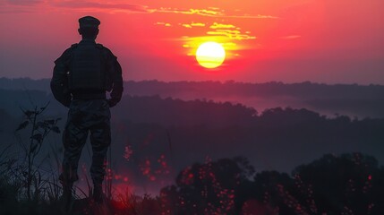 Fototapeta premium Silhouette of an environmental resource management officer working diligently, overlooking a forest reserve from a high vantage point. The officer is surrounded by nature, symbolizing their