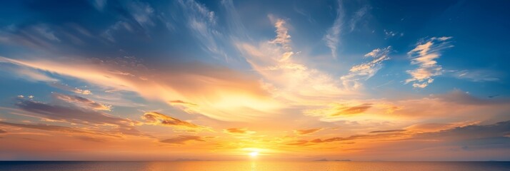 Fototapeta premium Beautiful Vivid sky painted by the sun leaving bright golden shades.Dense clouds in twilight sky in winter evening.Image of cloud sky on evening time.Evening Vivid sky with clouds.