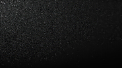 Top view of a black smooth asphalt road texture background.