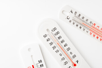 White Thermometers On White Background