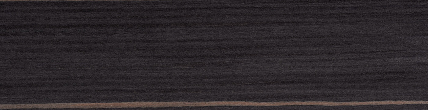 Stark, linear contrasts of mocha and licorice stripes orchestrate the bold aesthetic of this macassar veneer