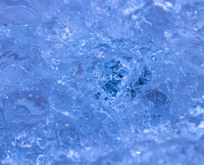 blue transparent ice as background.