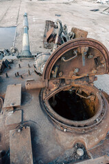 destroyed battle tank in a city lost during the war in Ukraine