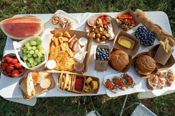 Close up view of bunch of tasty food in eco boxes, picnic time