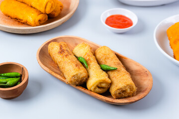 Indonesian Snack Sosis Solo Served with cayenne pepper. Sosis solo is deep fried snack with shredded chicken inside. perfect for recipe, article, catalogue, promotion, or any cooking contents.