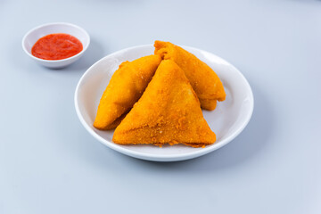 Risol or rissoles. served with chili sauce or chili. perfect for recipe, article, catalogue, promotion, or any cooking contents. with copy space.
