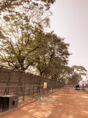 jogging track on the edge of the field in the afternoon