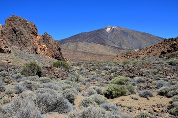 Scenic view of volcanic rock formations in desert during sunny day, Teide National Park, Tenerife