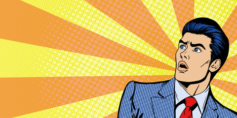Shocked young man with wide open eyes and open mouth stares at empty space for text. Yellow Banner template in retro pop art comic style. Vector background © Julisart